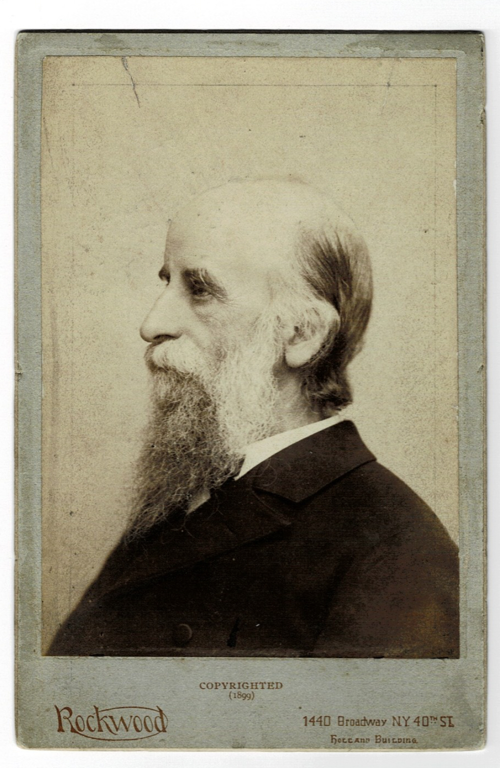 AN 1895 AUTOGRAPH LETTER SIGNED by LYMAN ABBOTT, CONGREGATIONALIST THEOLOGIAN and EDITOR of OUTLOOK WEEKLY thanking Mr. Langford for tickets to a concert by the violinist EUGENE YSAYE. [Together with]: AN ORIGINAL 1899 CABINET CARD PHOTO of Lyman Abbott by ROCKWOOD of New York.