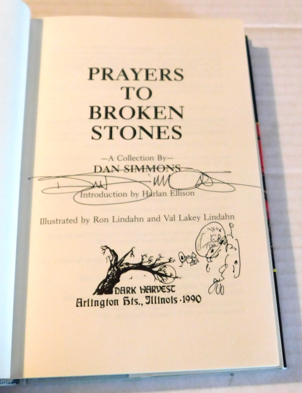 PRAYERS TO BROKEN STONES. A Collection by Dan Simmons. Introduction by Harlan Ellison. Illustrated by Ron Lindahn and Val Lakey Lindahn. [SIGNED with a PEN & INK DRAWING BY DAN SIMMONS].