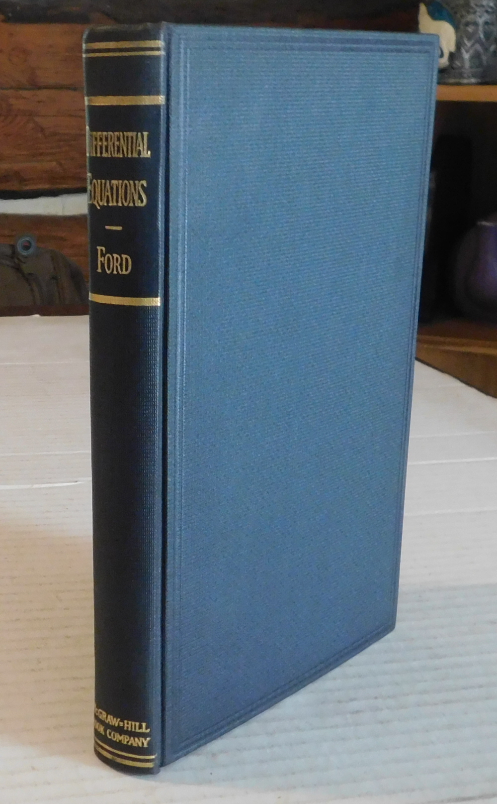 DIFFERENTIAL EQUATIONS. By Lester R. Ford, Ph.D. Professor of Mathematics and Chairman of the Department Armour Institute of Technology. [From the library of the laser research pioneer HENRY PLOTKIN, with his ownership signature & notes].