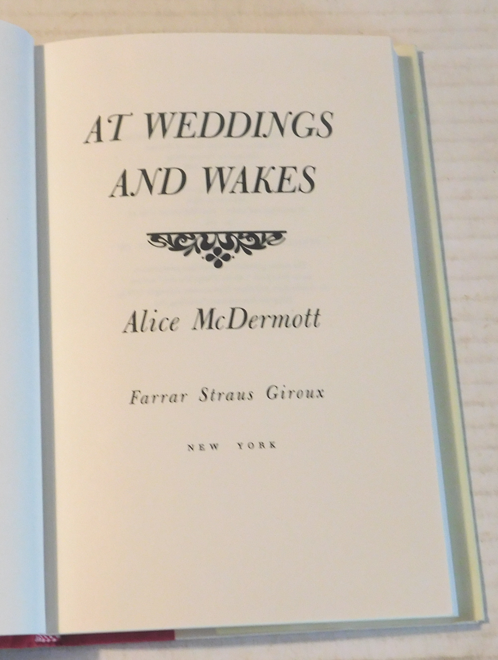 AT WEDDINGS AND WAKES. [SIGNED by ALICE McDERMOTT].